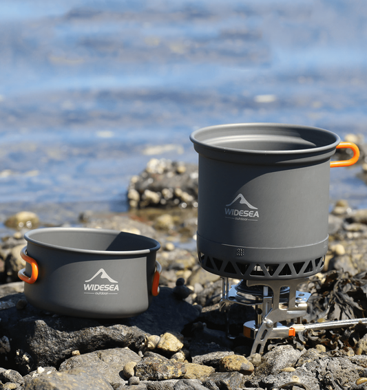 Compact camping cookware set with high-quality pots - perfect for outdoor cooking and backpacking.