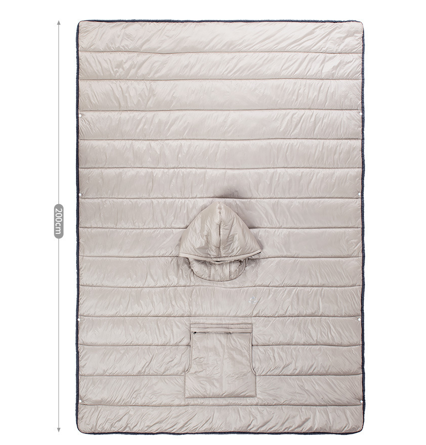 Unzipped cloak sleeping bag revealing premium materials and cold-proof insulation for a cozy night's sleep.