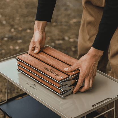 Versatile and foldable camping table – three-tier design for efficient organization on the go.