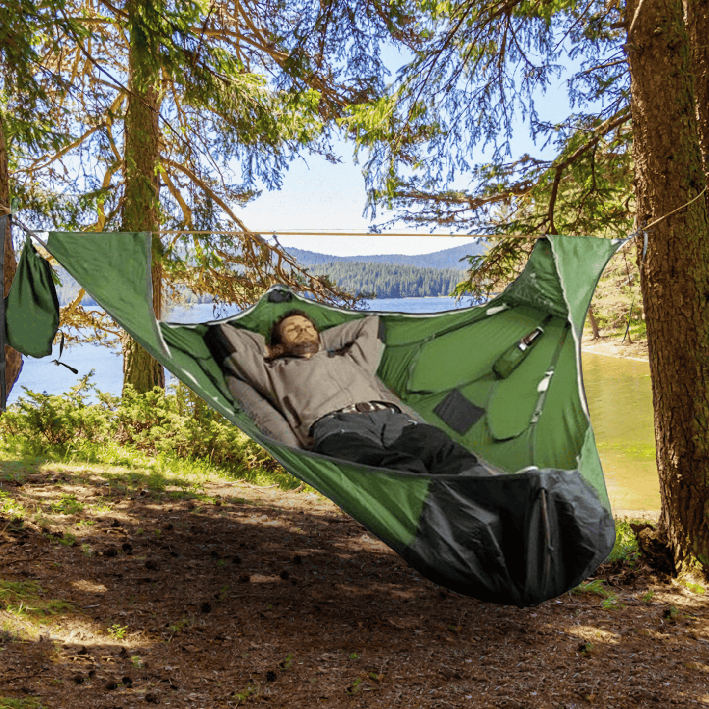 An image showcasing an innovative hammock with built-in compartments, a bottle holder, and ample storage for a convenient outdoor experience.