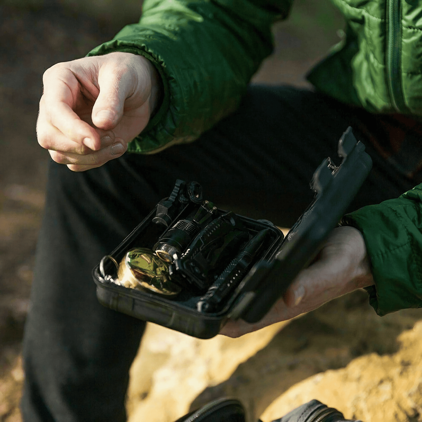 A sleek and durable black case designed to keep your Emergency Camping Survival Kit safe, waterproof, and shockproof.